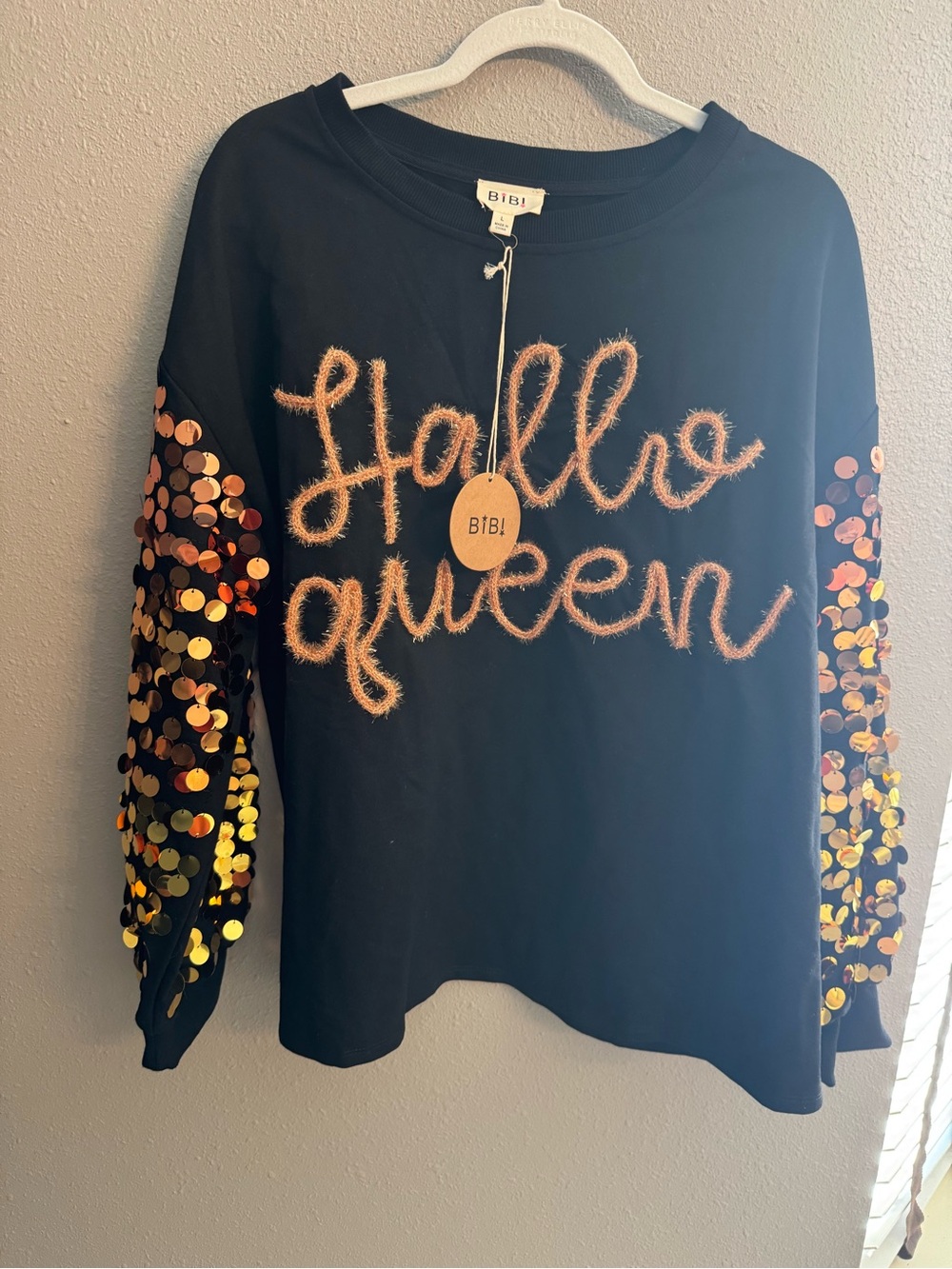 BiBi Black Sweatshirt with Orange Sequin Sleeve "Hallo Queen"
